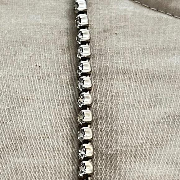 Tennis bracelet w/Clear Round prong set rhinestones & 1 large on clasp - Picture 9 of 15